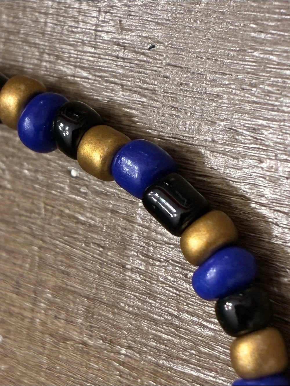 Handmade Blue, Black & Gold Beaded Bracelet with Heart Accent